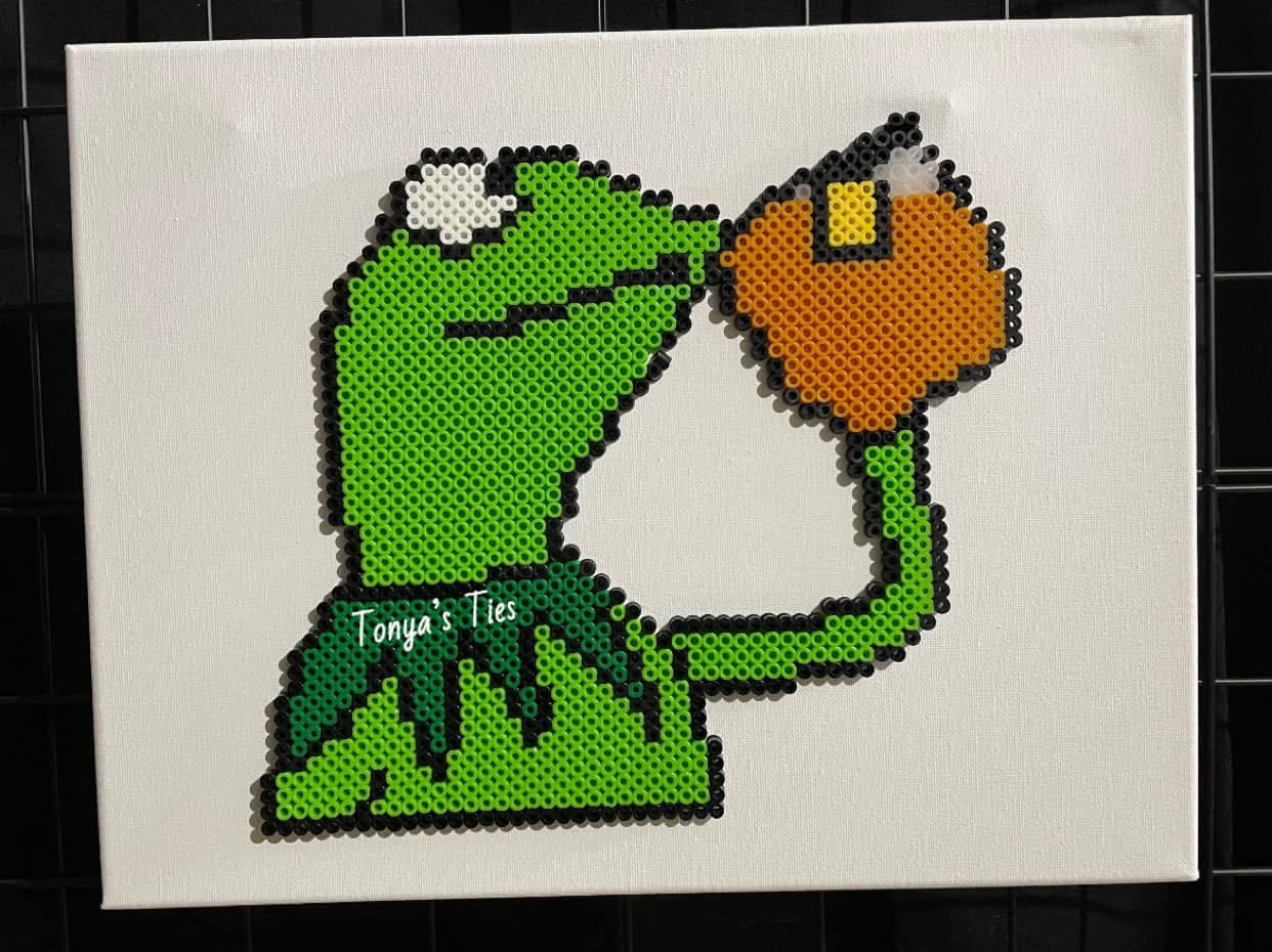 Frog drinking tea
